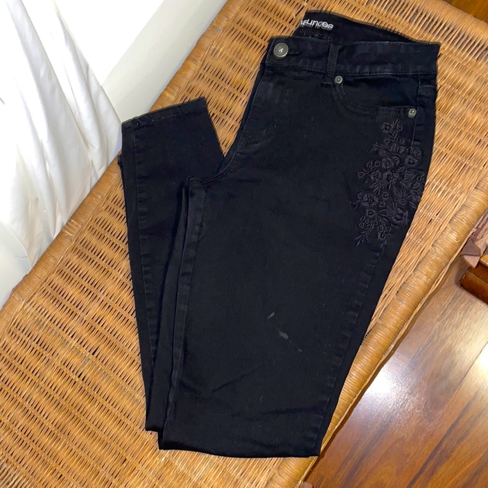 Black jeans w/ flower decals on hips